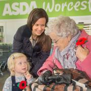 POPPY: Poppy, 2, with mum, Katy Swatton chatting to 99-year-old Beatrice Furlong.