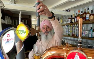 FUTURE: Jaswender Singh behind the bar of the revamped Red Lion at Witley Road in Holt Heath near Worcester