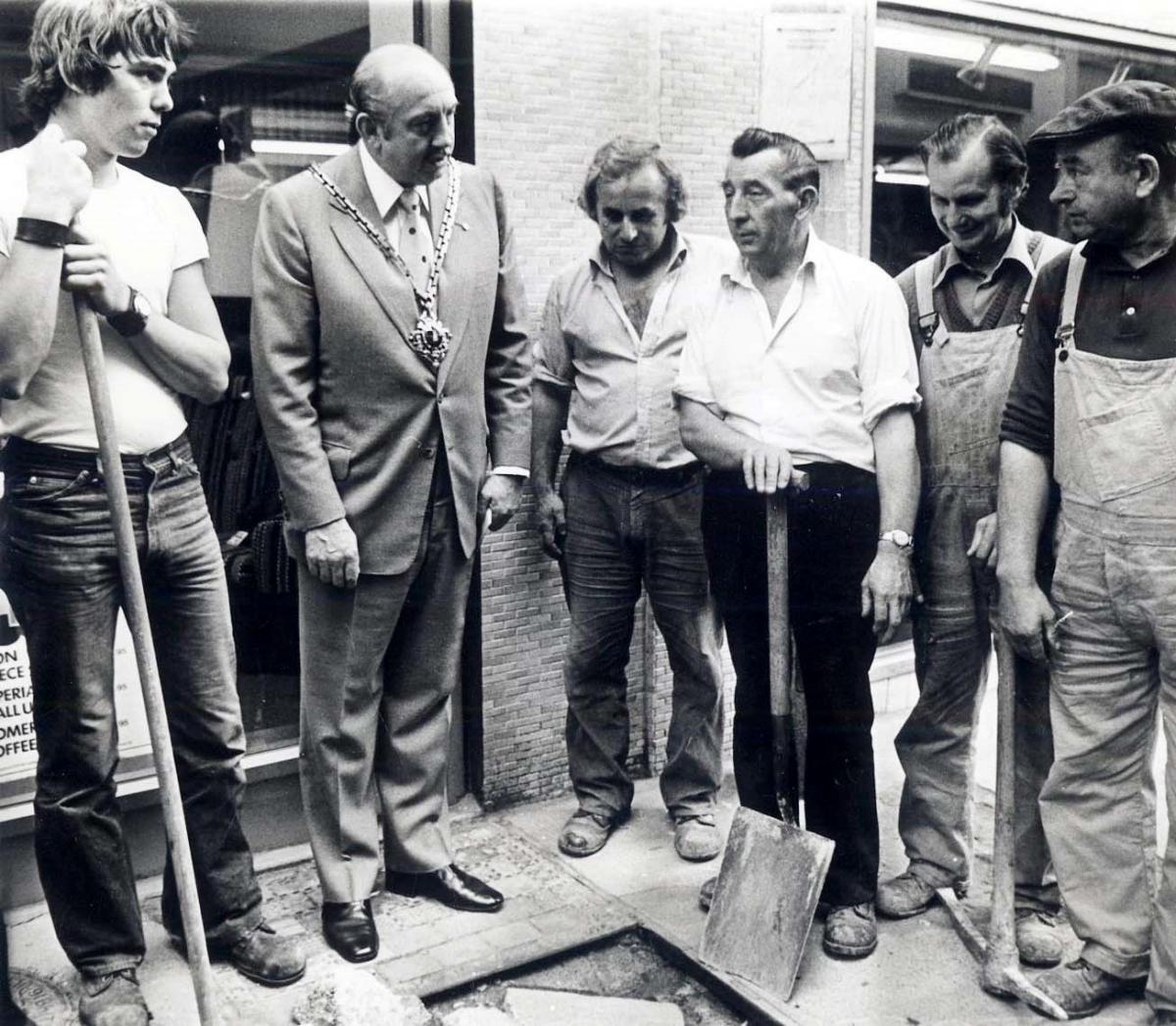 PRECARIOUS: Workmen, a hole in the ground, and Worcester’s Mayor Cllr Bob Bullock, who wasn’t exactly dressed for the job, in 1978