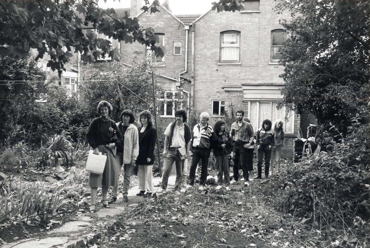 This  photograph was taken in September, 1990. It is not, as might be first imagined, a group of vagrants wandering around a bit of waste ground in Worcester, but members of the drama group St John’s Players “in character” looking for new rehearsal 