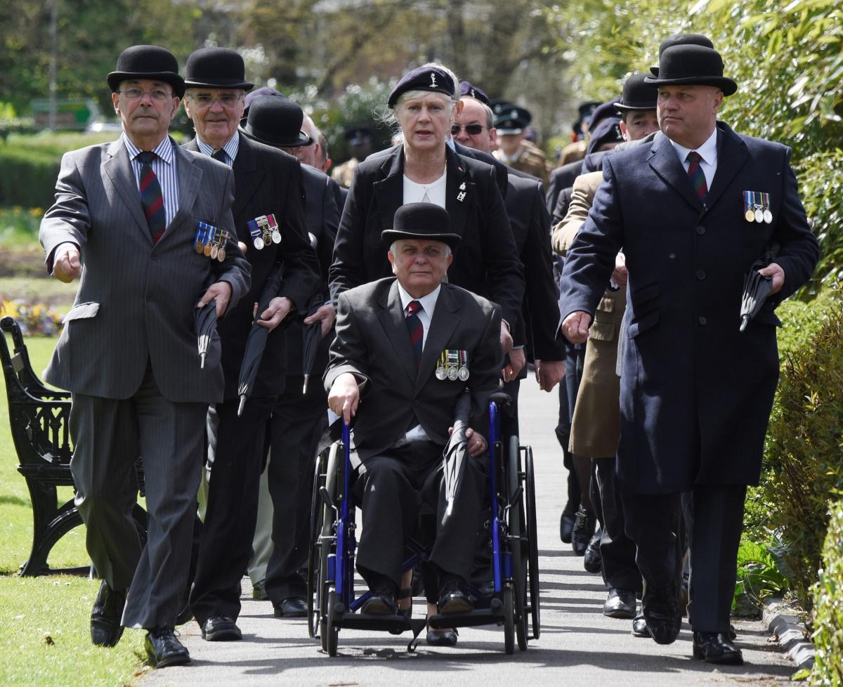 SOLEMN PARADE: Members of the Queen's Own Warwickshire and Worcestershire Yeomanry Comrades Association march through Cripplegate Park during the memorial service (Picture by David Griffiths 1616039001)