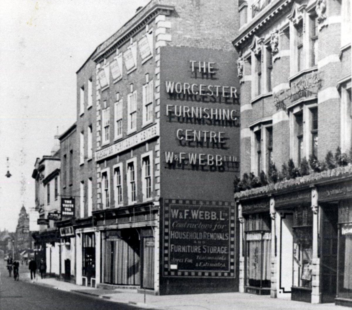 the premises of the Worcester Furnishing Centre at the south end of a row of shops pulled down in the 1920s and 1930s