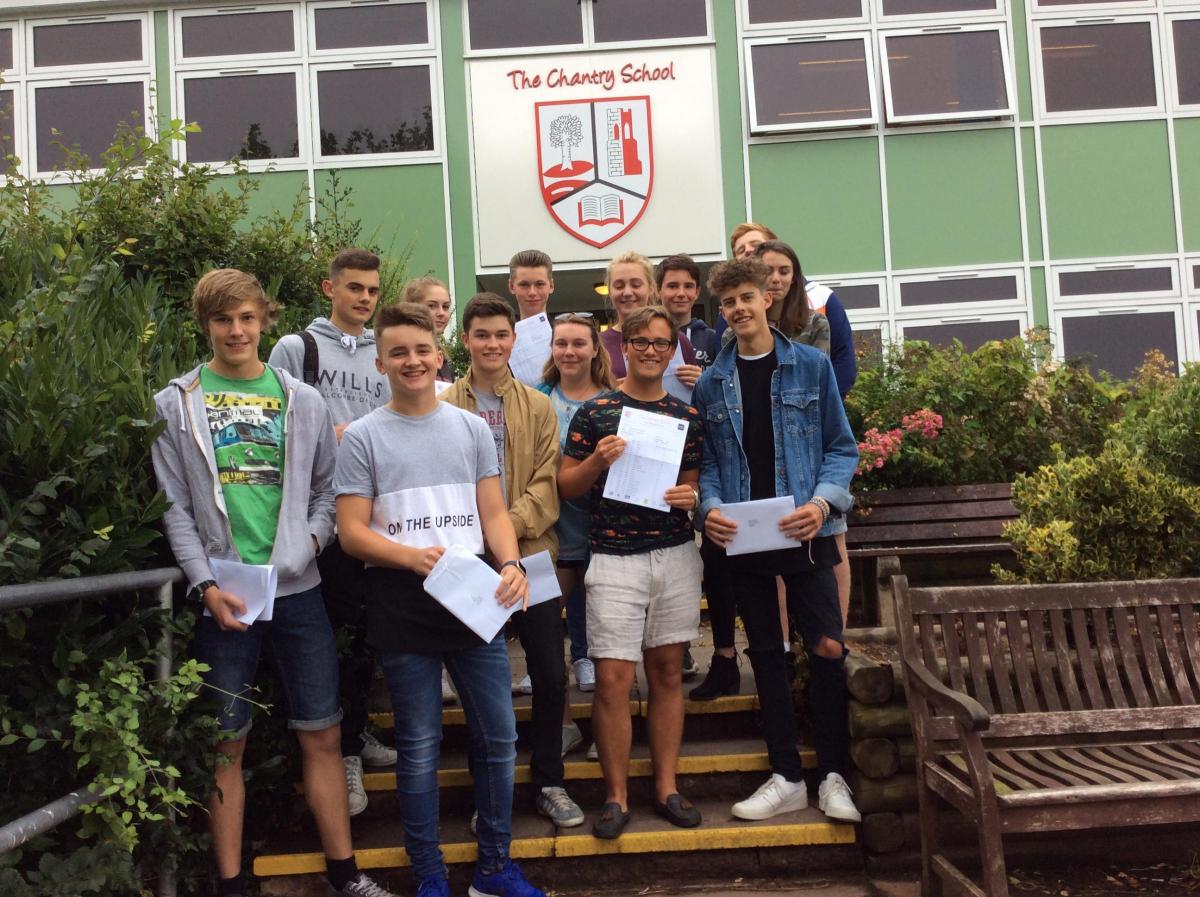 CHANTRY SCHOOL: Anthony Howells, Cameron Pickstock, Lewis Coglan, Mia Treadwell, Sam Galvin, Cameron Hill, Shannon Hunt, Immie Jones, Alex Randall, Jordan Smith, Aaron Cooper, Ollie Holford and Emilie Butler celebrate their GCSE results. Picture by Chantr