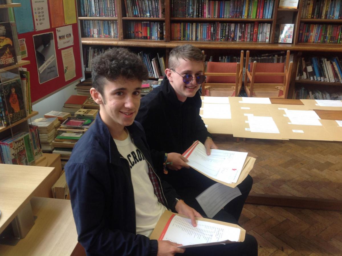 HANLEY CASTLE: Dan Jackson (left) and Dino Bradford collect their GCSE results on Thursday. Picture by Hanley Castle High School.