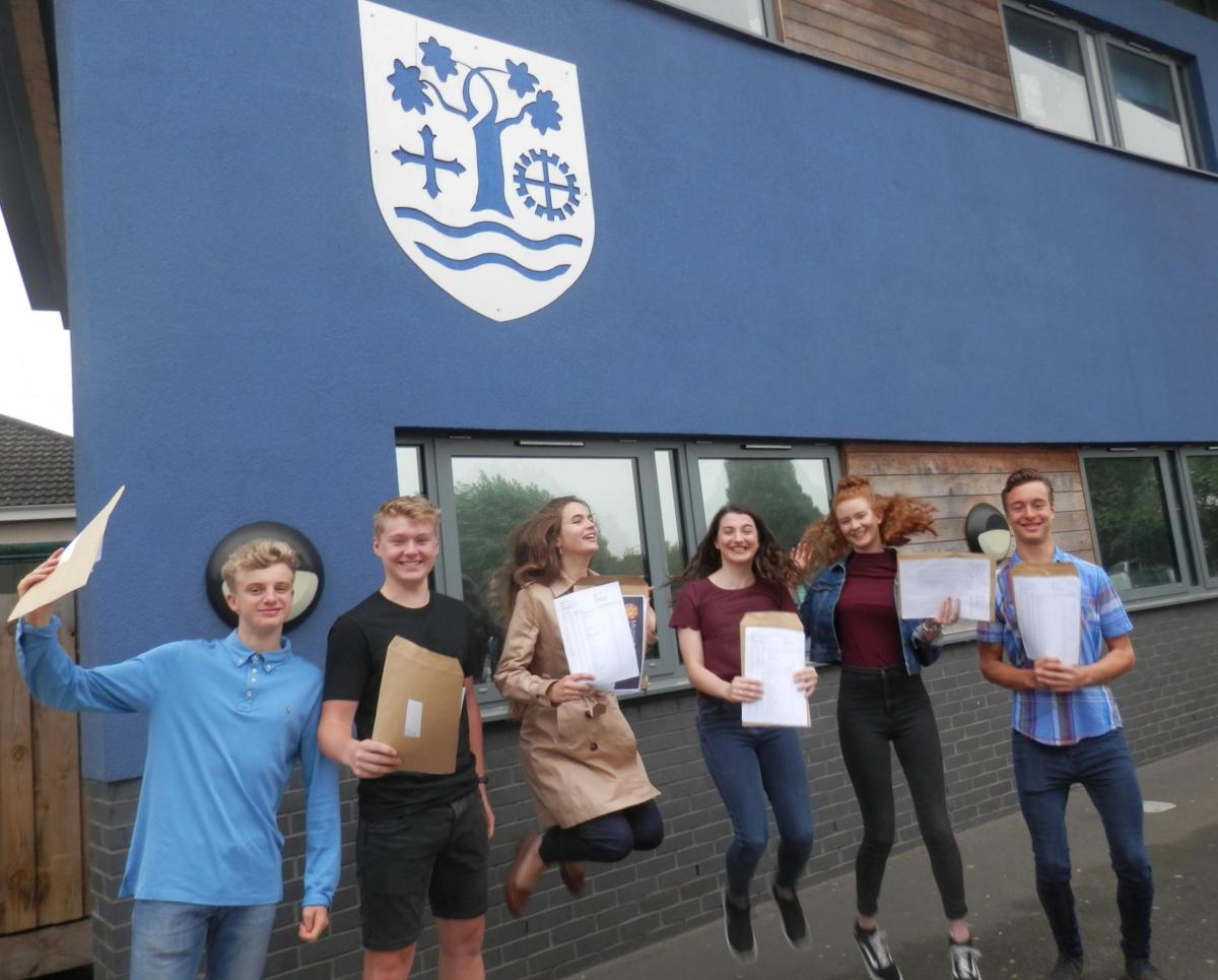 PERSHORE HIGH: Oliver Morgan, James Davidson, Erin Young, Jennifer Cooper, Rhianne Gale and William Parry celebrate after opening their GCSE results on Thursday morning. Picture by Pershore High School.