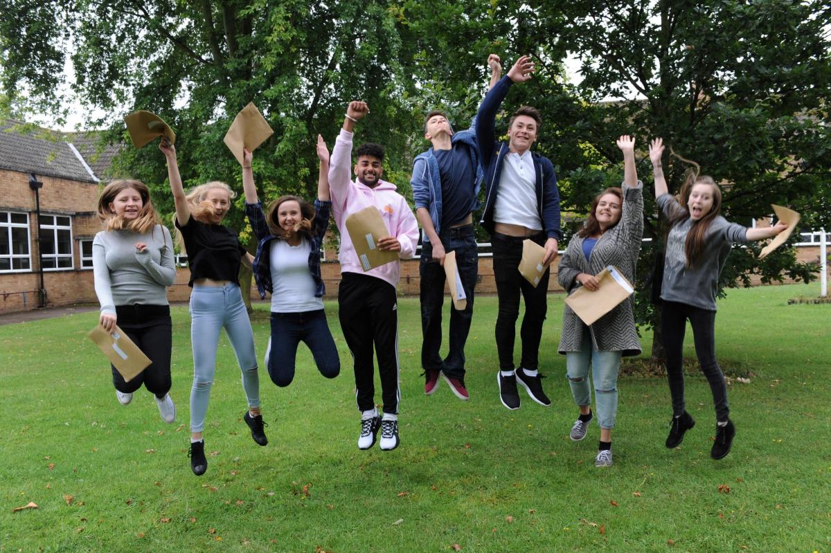 THE CHASE: Beth Price-Ayers, Megan Evans, Emily Brown, Jai Bains, Harry Thompson, Alex Smith, Katie Henshaw and Dani Cullen jump for joy after opening their GCSE results on Thursday morning. Picture by The Chase.