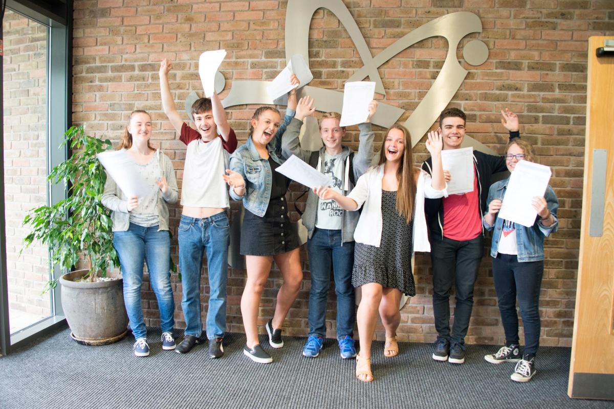 TUDOR GRANGE: Georgia Moore, Connor James, Cerys Danks Jonathan Underhill, Bryony Danks, Harry Garlick and Lucy Porter achieved a tremendous 14 A*s and 29 A grades between them. Picture by Tudor Grange Academy Worcester.