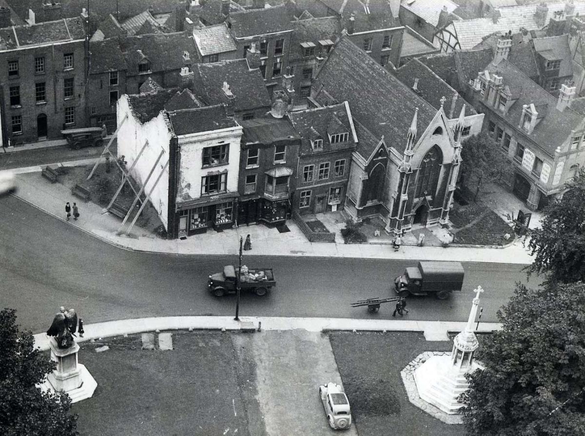 Vanished Worcester. A view from the top of the cathedral tower shows the row of buildings lining College Street, Worcester, with Lich Street behind them. The church is St Michael's, built in 1839 and pulled down in the 1960s