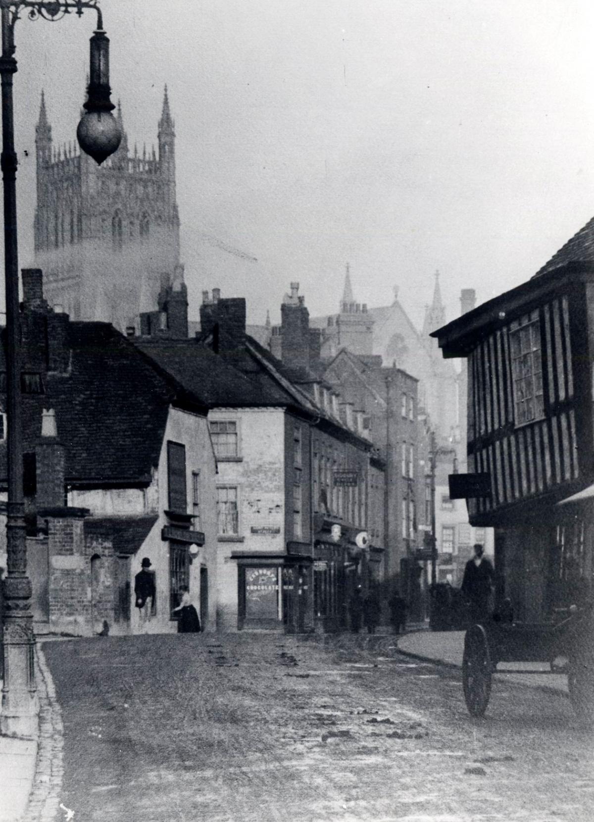 Vanished Worcester. Gas-lit Sidbury, Worcester, in Victorian times. The buildings on the left lined the eventually doomed south side of the street