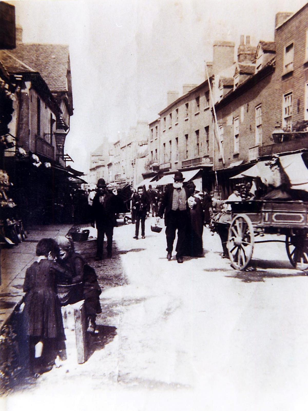 Vanished Worcester. A scene from the Shambles, Worcester, in Victorian times.