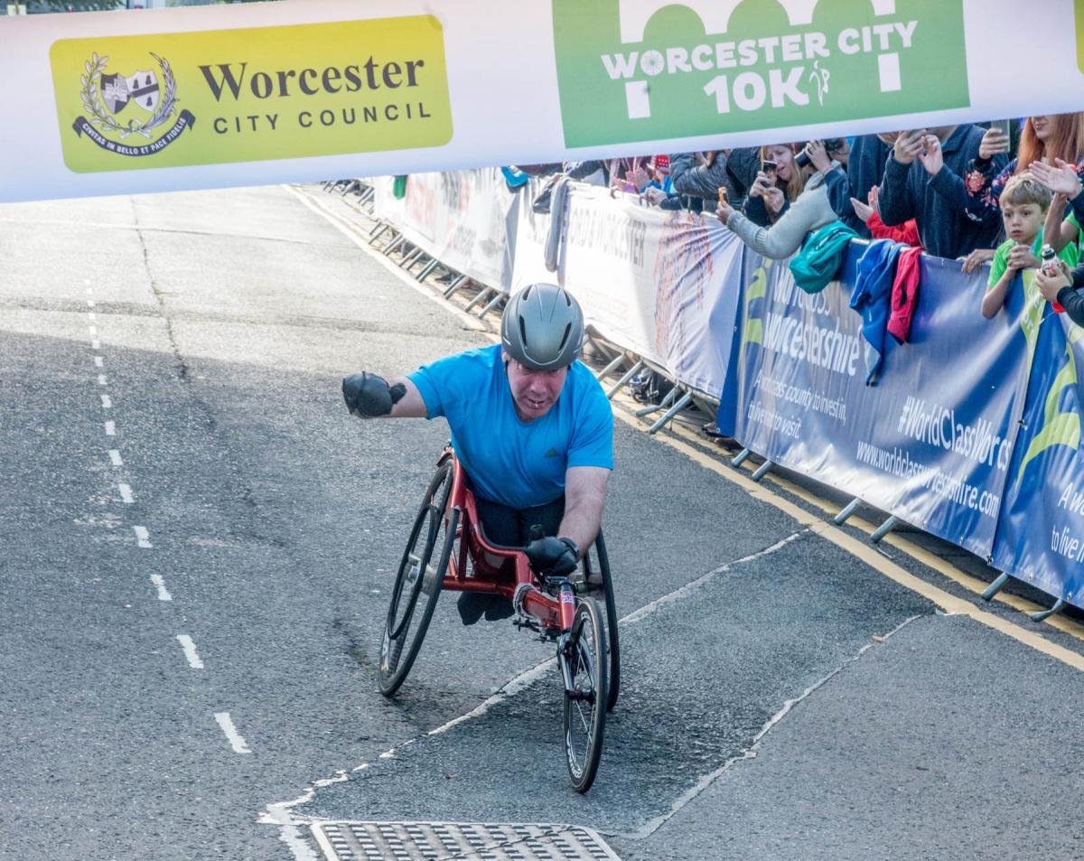 CHAMP: Ed Grazier, of Cheltenham Harriers, won first place in the Wheelchair 10K race. Picture by Martin Humby. 38160729107.