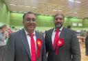 SMILES: Jabba Riaz (right) and Atif Sadiq after being re-elected on Friday