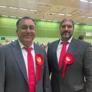 SMILES: Jabba Riaz (right) and Atif Sadiq after being re-elected on Friday