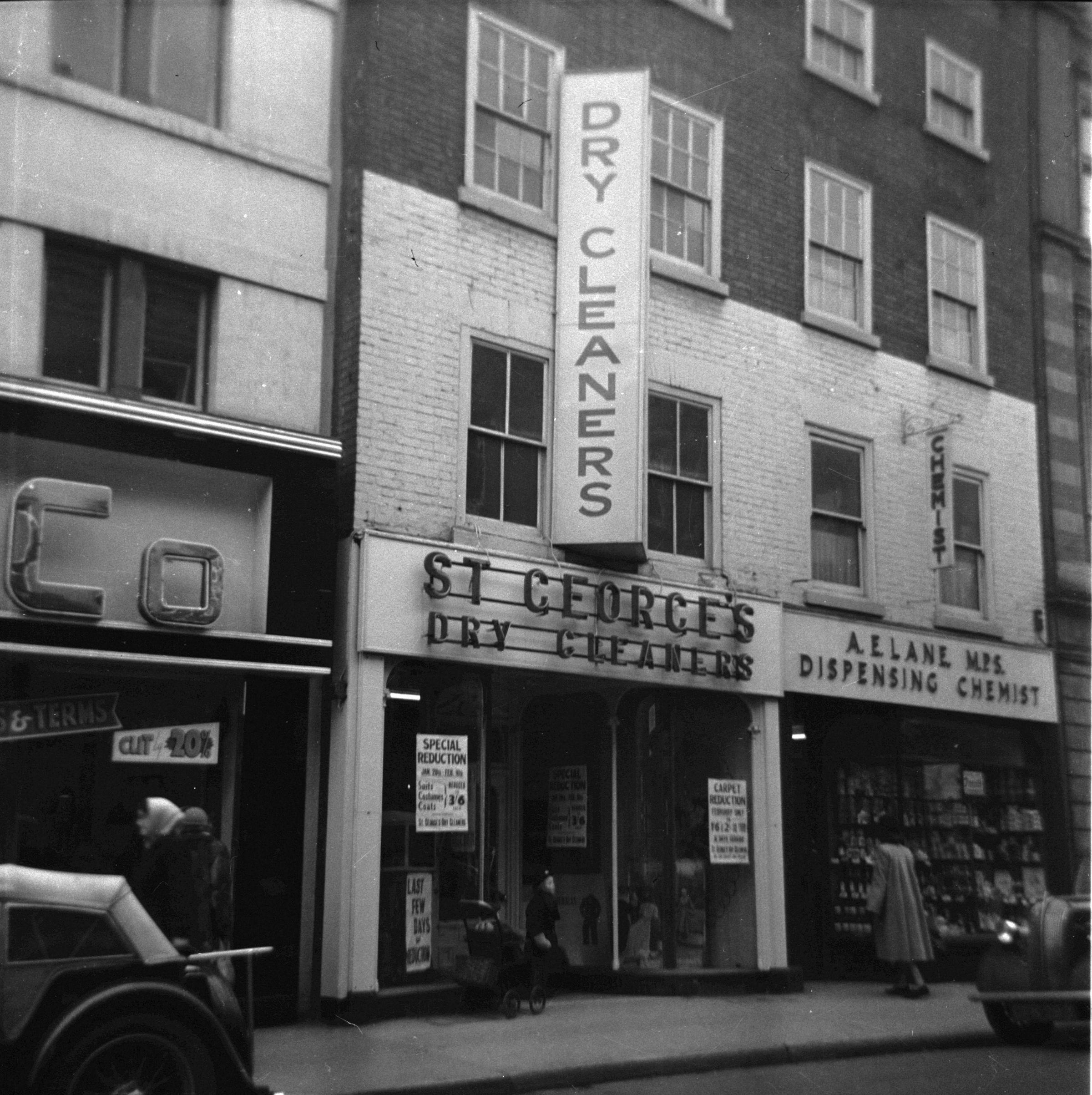 St George’s Dry Cleaners in St Swithin’s Street, in the 1950s. Hardy & Co furniture shop was to the left and on the right, A E Lane Dispensing chemist