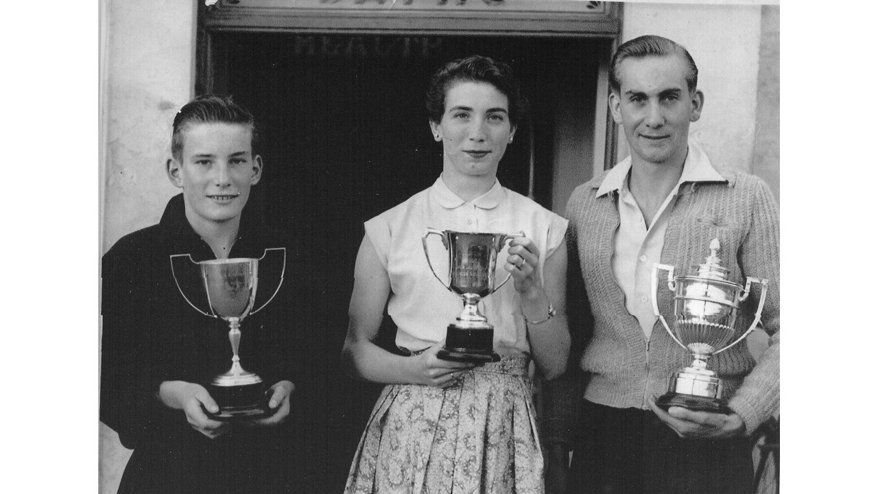 Eddie Awford, pictured on the left here, winner of the Worcester Swimming Club Junior Mens all-round Championship. To his right is pictured Miss Valerie Roberts, Ladies 100 yards ‘Evening News ‘Cup champion and Mr R. Bradley who won the Senior