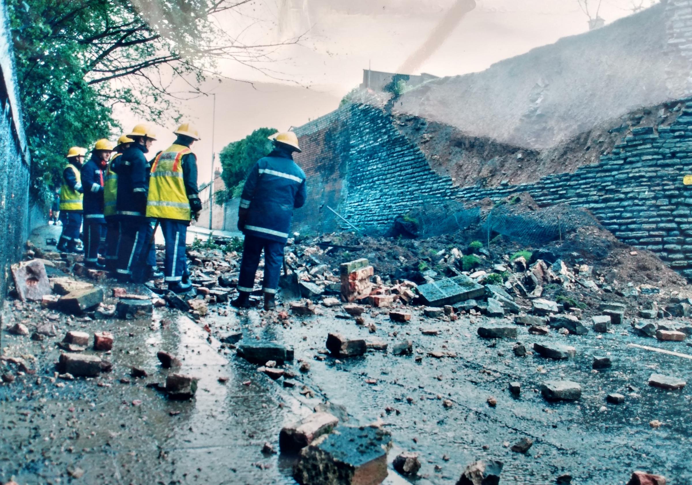 April 1998 and one of the most dramatic recent events was a consequence of the Easter floods when a 20ft wall that formed the boundary to the garden of a house came crashing down across the road. Firefighters initially feared someone had been trapped