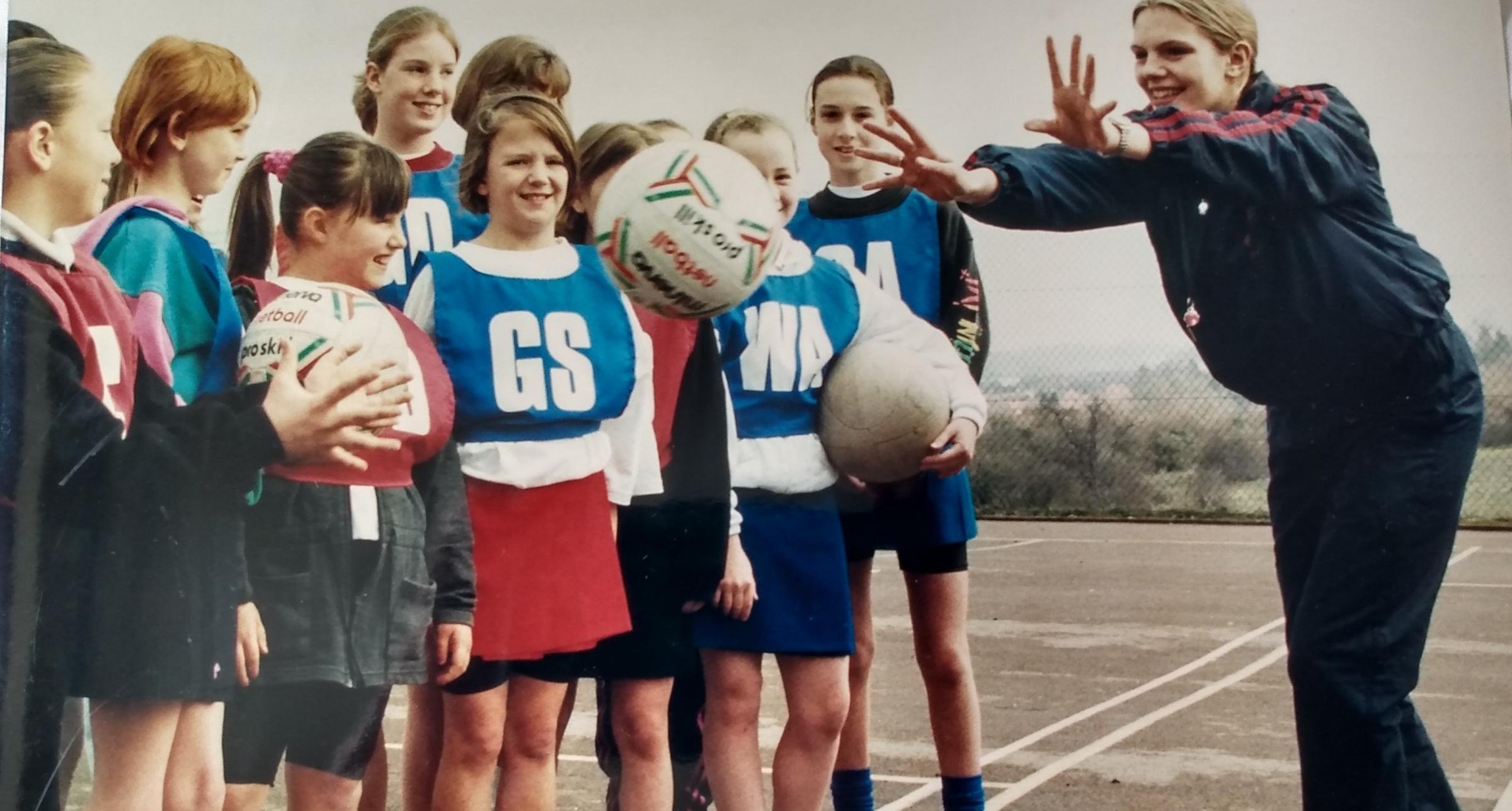 March 1996 and some young netballers are given some passing tips