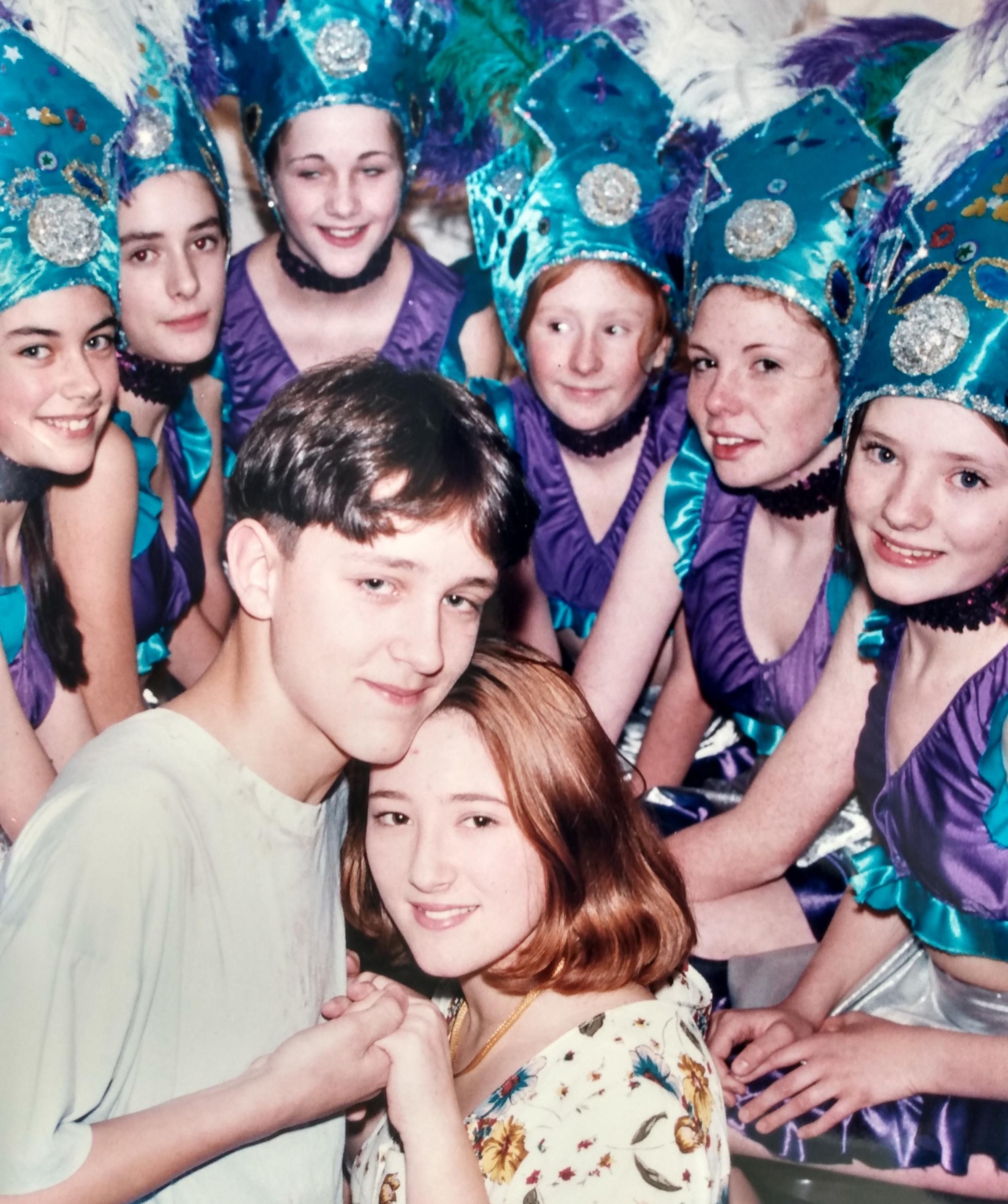 December 1995 and the school put on a musical Rio, having written the music and much of the script of the love story set in Brazil. Pictured are Matthew Harrison and Laura Synnocks and some of the carnival dancers