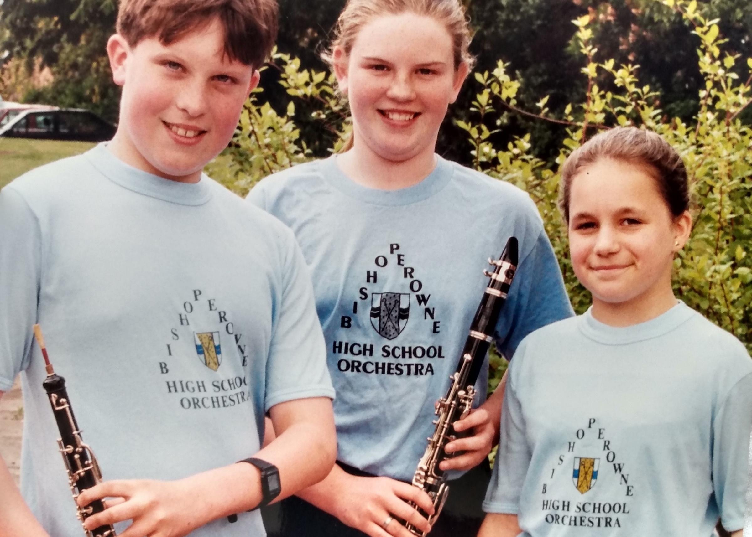 June 1995 and the school had to put out a plea to former members of the schools orchestra to return T-shirts in time for the school fete – about half were missing. Pictured are Peter Kitchen, Hannah Glanville and Elinor Martin