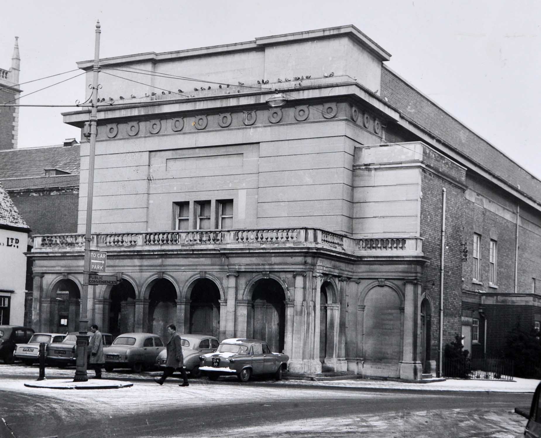 Worcester’s Public Hall was built on the north side of the Cornmarket, on the side of the old Wheatsheaf Inn. It was eventually demolished in 1966 to make more room for car parking