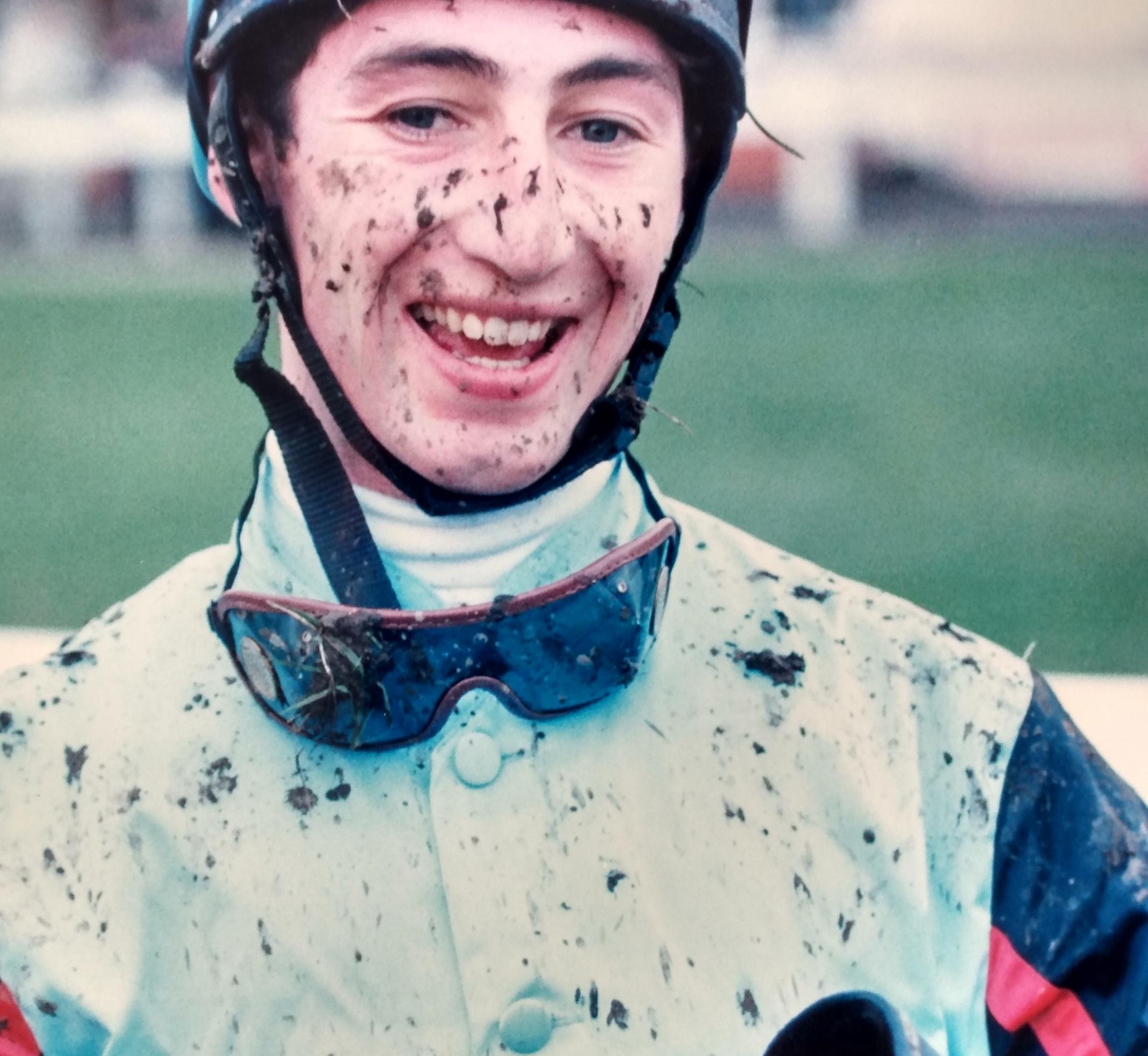 A mud-spattered but still smiling jockey David Finnegan in November 1995 
