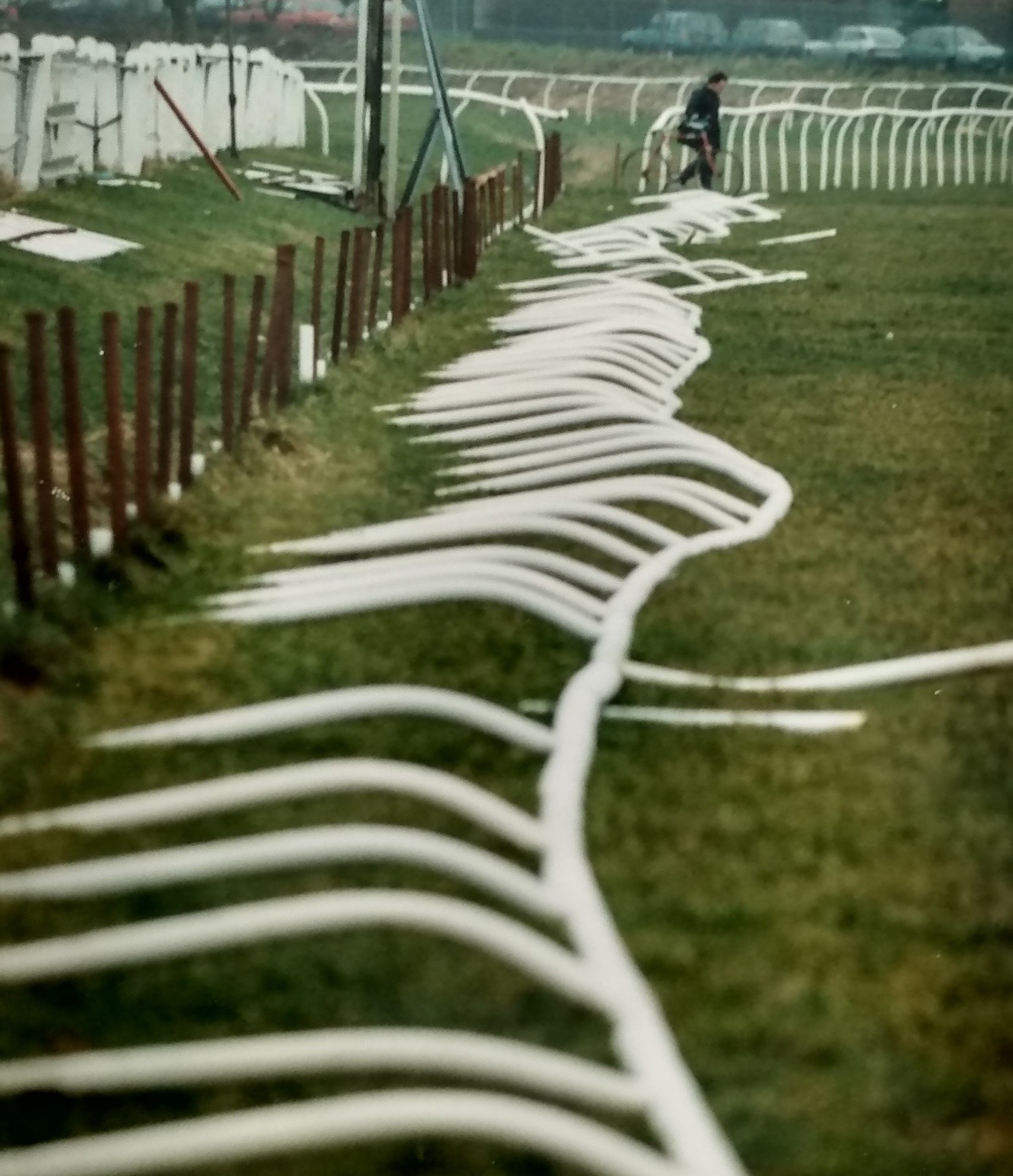 Plastic rails laid out ready for erection in March 1996. Vandalism fears had delayed the course putting them up