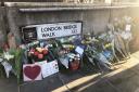 Flowers left at London Bridge in central London, following the London Bridge terror attack on Friday. A vigil will be held on Monday to pay tribute to the victims of the attack and to honour the emergency services and members of the public who responded t