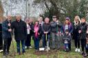 The tree planting as neighbours gathered.