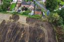 SCORCHED: The photo shows how close the 'deliberate' fire came to people's homes in Old Malvern Road, Powick