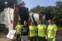 Resident John Tandy with the Saturday Skip workers.