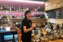 FRIENDLY: Chloe Wright serves behind the bar at Ale Hub in St Peter's Drive, Worcester