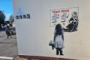 NEW ART: The 'Teach Peace' new artwork on The Bull Inn
