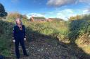 CHANGES: Cllr Jill Dersayrah at the site of the path which is beginning to be cleared by hand by