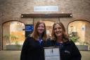 Joanne Franklin, Customer Services Manager and Lisa Normoyle, Customer Services Advisor, celebrate Wychavon retaining Customer Service Excellence status