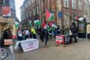 Palestine flags are waved at a protest in Worcester
