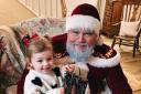 Father Christmas, played by Carl Sampson, visits the youngsters
