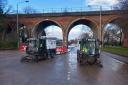 Workers clean up Hylton Road, which has reopened, on Sunday