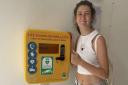 LIFESAVING: Amy Shadbolt pictured with a university defibrillator