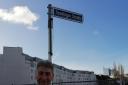 Councillor Tony Page, the Mayor of Reading, next to the newly named Readinger Strasse in Dusseldorf, Germany. Credit: The Mayor of Reading