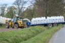 Load of fertiliser going over ditch at Knollhead, Kettins, Blairgowrie.
