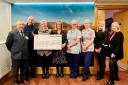 Cheque presented to Pendleside Hospice on behalf of Eric Wright Charitable Trust