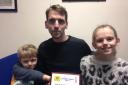 SPEED MERCHANT: Ian Radford, centre, with his children Max Radford, six, and Immy Radford, 10.
