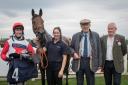 Winning mare Majestic Moll with jockey Adam Wedge and owners at Worcester. Picture: Nigel Kirby Photography