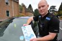 PC Dave Wise with the innovative tax disc holder medical information card.