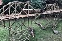 Tarquin Shaw-Young built a scale model scene from Bridge on the River Kwai in his back garden.