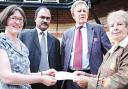 CHEQUE handover: From left, Ms Rachel Bright Thomas, consultant breast surgeon; Dr Salim Shafeek, consultant haematologist; Dr Stuart King GP, and Mrs June King, patron.