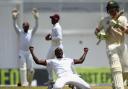 KINGSTON, JAMAICA - JUNE 12:  Jerome Taylor of West Indies celebrates after taking the wicket of Steve Smith of Australia LBW for 199 runs during day two of the Second Test match between Australia and the West Indies at Sabina Park on June 12, 2015 in