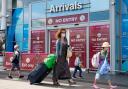 AIRPORT: Travellers arrive at Birmingham Airport. Picture: Jacob King/PA Wire