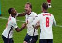 Raheem Sterling, Harry Kane and Jordan Henderson celebrate after beating Denmark 2-1 at the Euro 2020 semi-finals.