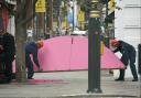 Extinction Rebellion have giant pink table dismantled by police during protest. (PA)
